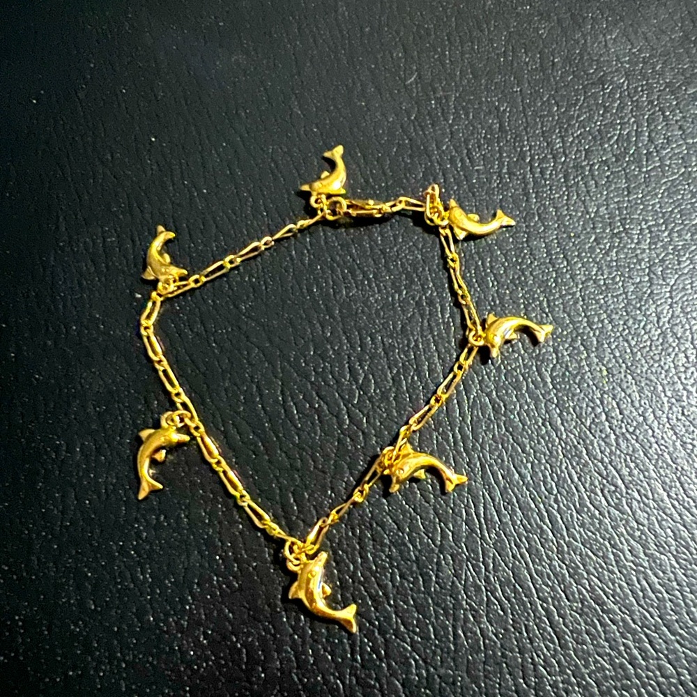 Vintage gold plated dolphin charm bracelet